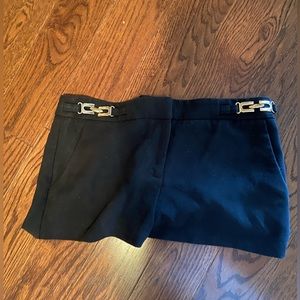 Black suit style shorts with hardware on sides